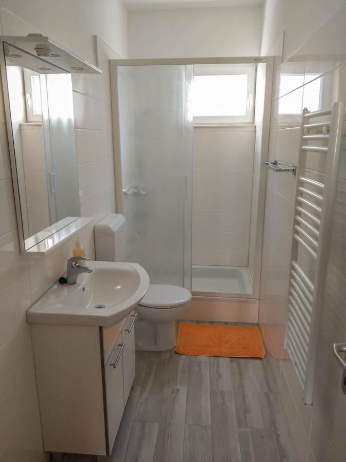 Apartman Riva K Podgora Bagian luar foto